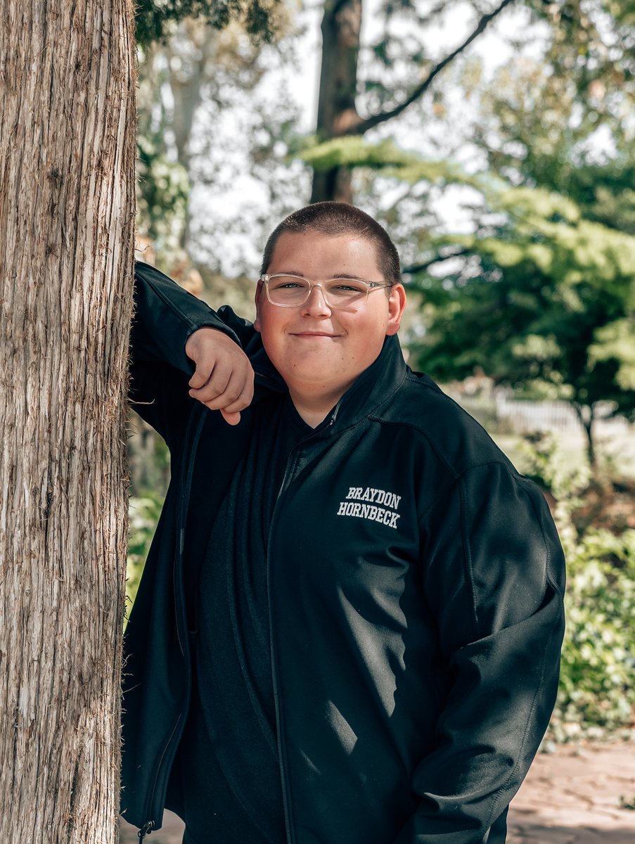 Braydon Hornbeck smiling outdoors