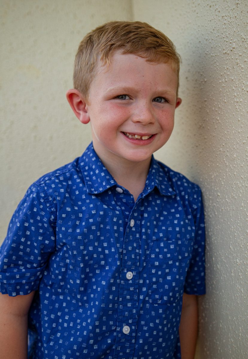 Close-up smiling portrait of a young boy